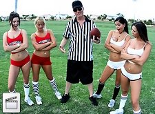 Horny football players playing for the referees big and long prize in his shorts